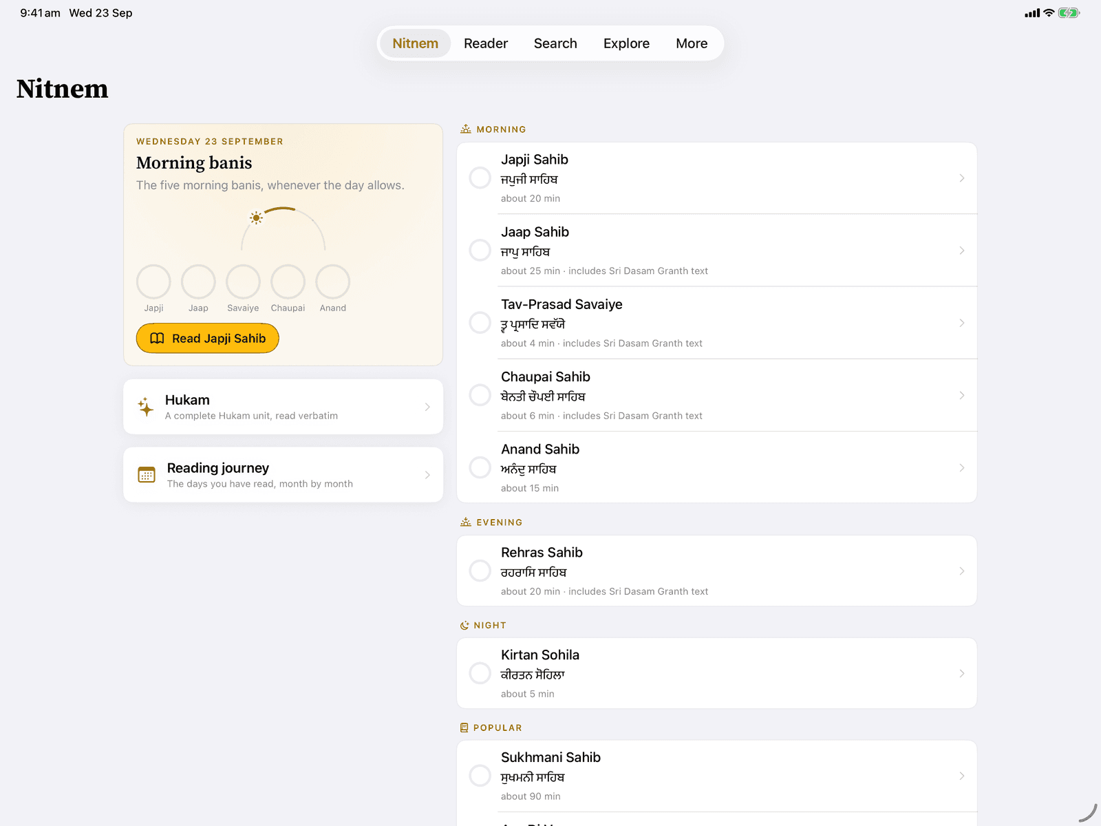 Nitnem on iPad in landscape: the morning banis with progress rings, and the full list by time of day